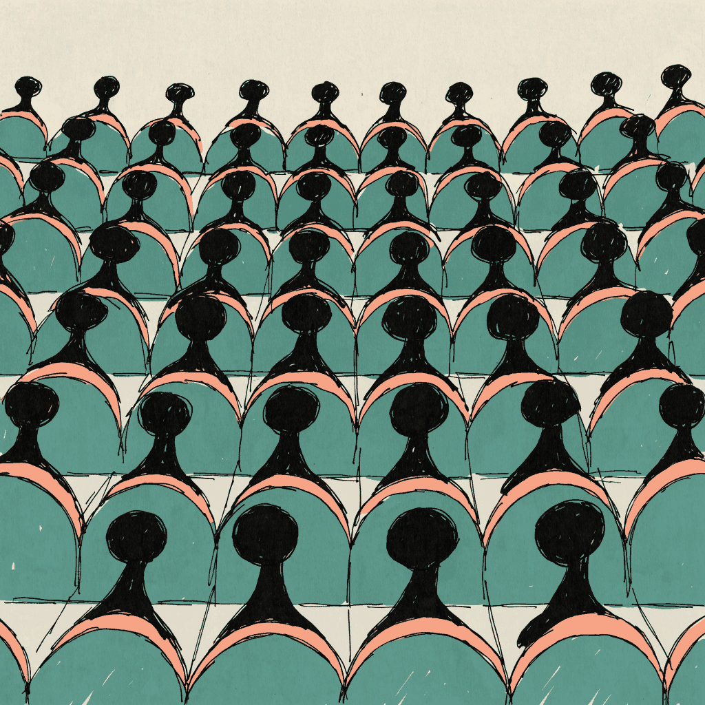 Rows of cinema seats seen from behind, all the silhouettes identical