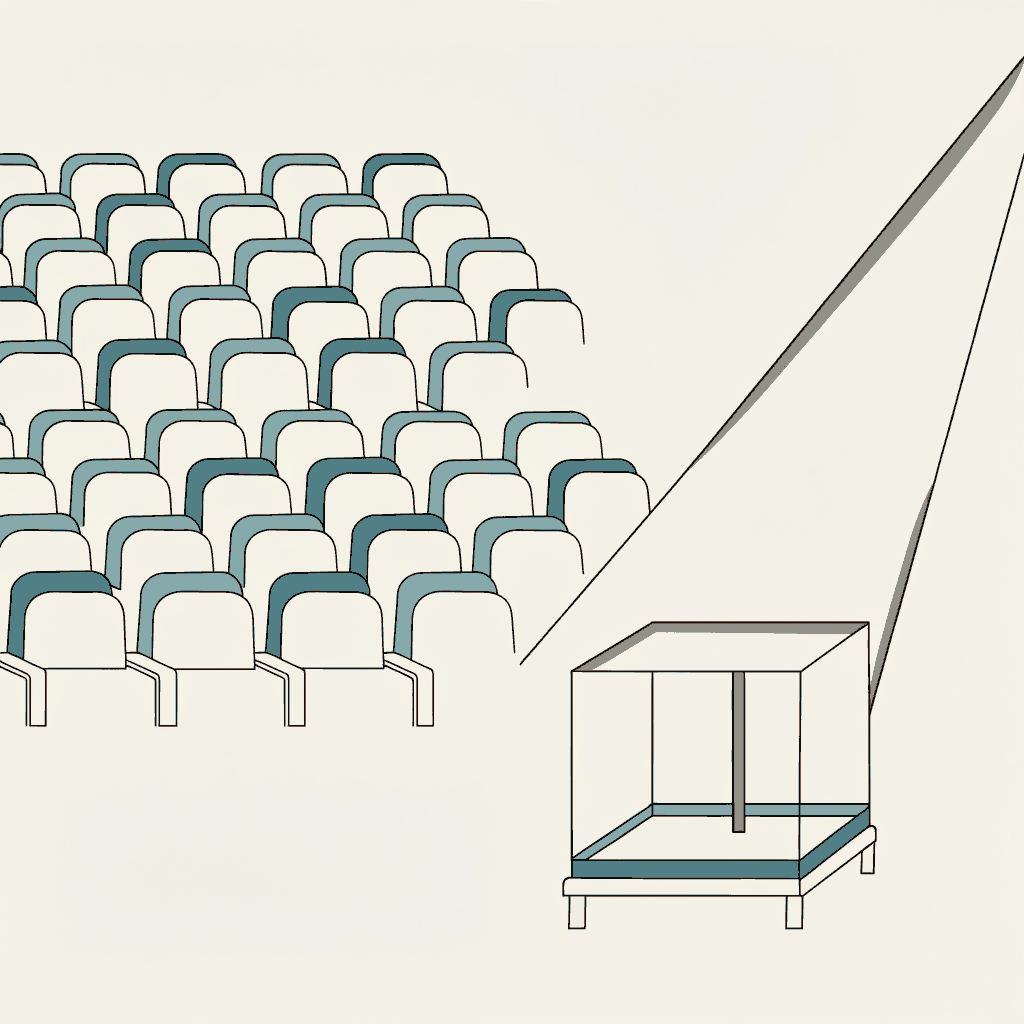 A sold-out arena crowd craning to look into a spotlit glass terrarium that holds nothing