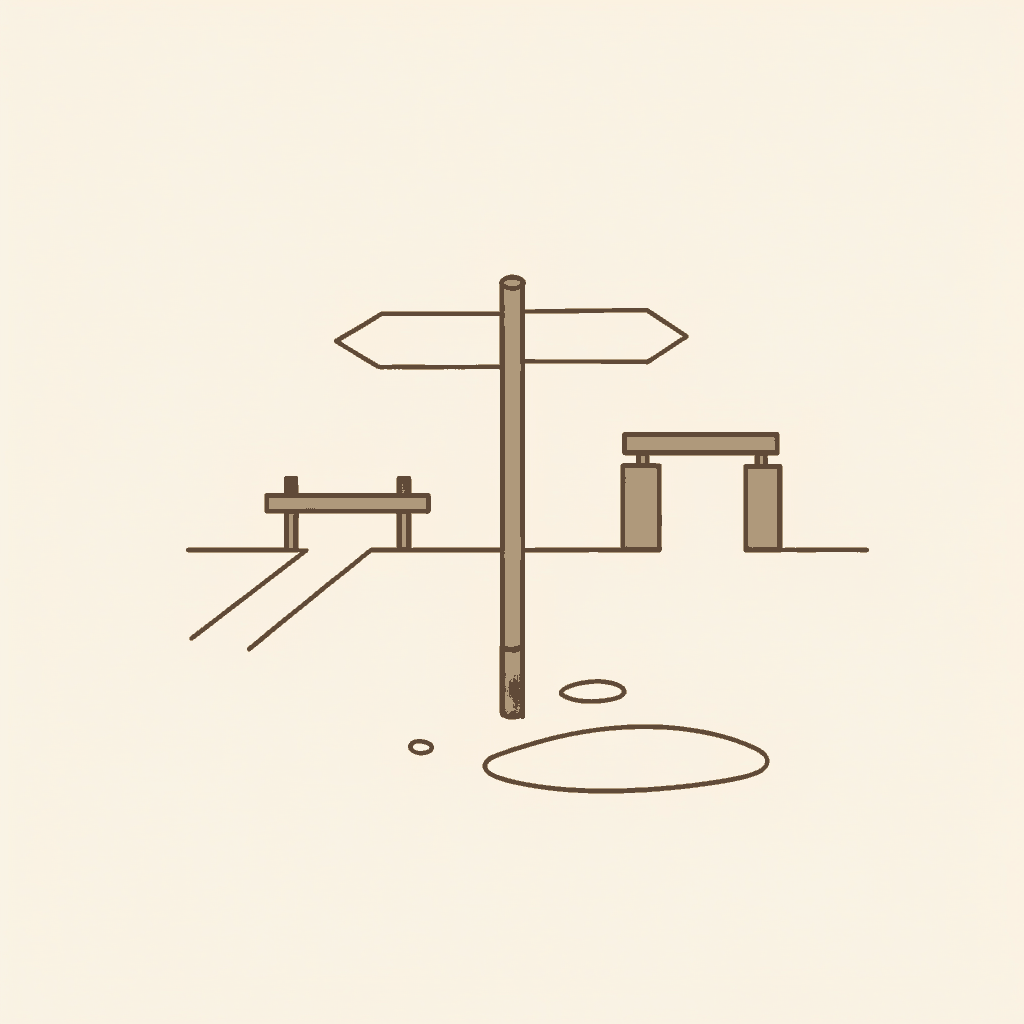 A crossroads signpost with two blank arms, one toward a ferry port and the other toward a barracks gate